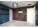 Stylish bedroom with wood accent wall and shelves at 3581 Baywater Trl, Snellville, GA 30039