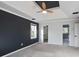 Spacious bedroom with ceiling fan and large closet at 3581 Baywater Trl, Snellville, GA 30039