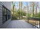 Private deck overlooking wooded backyard at 3581 Baywater Trl, Snellville, GA 30039