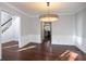 Bright dining room with hardwood floors and chandelier at 3581 Baywater Trl, Snellville, GA 30039
