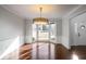 Dining room with hardwood floors and bay window at 3581 Baywater Trl, Snellville, GA 30039