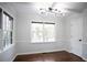 Bright dining room with hardwood floors and large windows at 3581 Baywater Trl, Snellville, GA 30039
