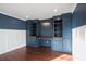 Spacious home office with built-in shelving and cabinetry at 3581 Baywater Trl, Snellville, GA 30039