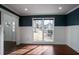 Bright home office with wainscoting and hardwood floors at 3581 Baywater Trl, Snellville, GA 30039
