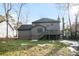 Rear view of house with deck and yard at 3581 Baywater Trl, Snellville, GA 30039