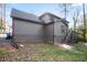 Rear view of house, gray siding, deck, and stairs at 3581 Baywater Trl, Snellville, GA 30039