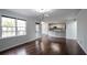 Open concept living room and kitchen with hardwood floors at 3581 Baywater Trl, Snellville, GA 30039