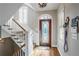 Bright entryway with hardwood floors and stained glass door at 1106 Fairway Ne Gdns, Atlanta, GA 30319