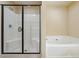 Bathroom with shower and soaking tub at 150 Shaker Hollow Dr, Mcdonough, GA 30253