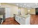 Modern kitchen with white cabinets, granite counters and stainless steel appliances at 150 Shaker Hollow Dr, Mcdonough, GA 30253