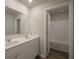 Bathroom with double vanity and shower/tub combo at 337 Amsterdam Way, Hampton, GA 30228