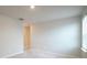 Spacious bedroom with neutral walls and carpet at 337 Amsterdam Way, Hampton, GA 30228