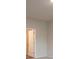 Bright bedroom with neutral walls and carpeting at 337 Amsterdam Way, Hampton, GA 30228