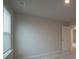 Spacious bedroom with neutral walls and window blinds at 337 Amsterdam Way, Hampton, GA 30228