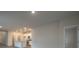 Open kitchen with island and recessed lighting at 337 Amsterdam Way, Hampton, GA 30228