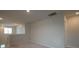 Loft area with carpet and access to bedroom at 337 Amsterdam Way, Hampton, GA 30228