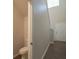 Small powder room with toilet and flooring at 337 Amsterdam Way, Hampton, GA 30228