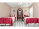 Bedroom with two twin beds, dresser and window at 510 Park Creek Rdg, Alpharetta, GA 30005