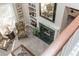 High-angle view of living room with fireplace and comfortable seating at 510 Park Creek Rdg, Alpharetta, GA 30005