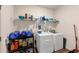 Laundry room with washer, dryer, and extra storage at 7250 Lacey Dr, Douglasville, GA 30134