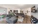 Spacious living room with hardwood floors and sectional sofa at 7250 Lacey Dr, Douglasville, GA 30134