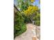 Stone patio pathway bordered by lush landscaping and trees at 1170 Oakdale Rd, Atlanta, GA 30307