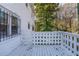 Outdoor deck with a white wooden railing offering a relaxing outdoor space at 5823 Button Gwinnett Pl, Norcross, GA 30093