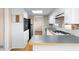 Well-maintained kitchen features essential appliances and counter space at 5823 Button Gwinnett Pl, Norcross, GA 30093