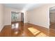Hardwood floors and open concept living area at 5823 Button Gwinnett Pl, Norcross, GA 30093
