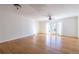 Spacious living room with hardwood floors and access to private patio at 6700 Roswell Rd # 17D, Roswell, GA 30328