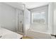 Bathroom includes a shower, bathtub and neutral colors at 216 Parc View Ln, Woodstock, GA 30188