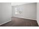 Simple bedroom with neutral walls and carpet at 216 Parc View Ln, Woodstock, GA 30188