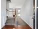 Bright entry hall with hardwood floors and a staircase leading upstairs at 216 Parc View Ln, Woodstock, GA 30188
