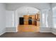 Open concept kitchen with island and breakfast nook at 216 Parc View Ln, Woodstock, GA 30188