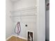 Bright laundry room with shelving and hookups at 216 Parc View Ln, Woodstock, GA 30188