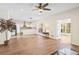 Open concept living room with kitchen view and hardwood floors at 3811 Breneau Ct, Decatur, GA 30034