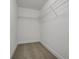 Walk-in closet with wire shelving, providing ample storage space at 428 Dahlia St, Mcdonough, GA 30253