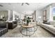 Living room with two leather armchairs and a coffee table at 428 Dahlia St, Mcdonough, GA 30253