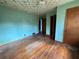 Large bedroom with hardwood floors and light teal walls at 1261 Cliffwood Se Dr, Smyrna, GA 30080