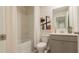 Simple bathroom with a tub shower combination and gray vanity at 2456 Bayberry St, Acworth, GA 30101