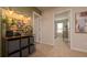 Home hallway with an open view into a bedroom and decorative wall art at 2456 Bayberry St, Acworth, GA 30101