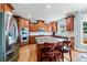 Modern kitchen with stainless steel appliances and granite counters at 4805 Blossom Ct, Cumming, GA 30028