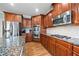 Well-equipped kitchen featuring stainless steel appliances at 4805 Blossom Ct, Cumming, GA 30028