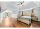 Large main bedroom with high ceilings, hardwood floors and sitting area at 4805 Blossom Ct, Cumming, GA 30028