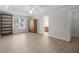 Main bedroom with updated flooring, walk-in closet and ceiling fan at 1237 Torrey Pl, Dacula, GA 30019