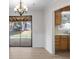 Dining area with sliding glass doors to backyard and kitchen access at 1237 Torrey Pl, Dacula, GA 30019