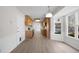 View of kitchen and dining room with updated flooring at 1237 Torrey Pl, Dacula, GA 30019