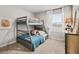 bedroom featuring a bunk bed, decor, plush bedding, and natural light from the window at 2476 Bayberry St, Acworth, GA 30101