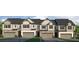 New construction townhomes, multiple units, with garages and manicured lawns at 2476 Bayberry St, Acworth, GA 30101