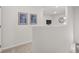 Bright hallway with neutral carpeting and modern wall art at 2476 Bayberry St, Acworth, GA 30101